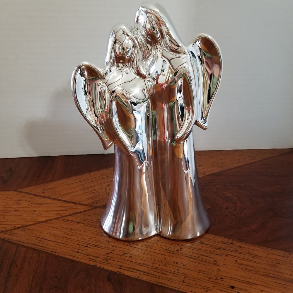 Two female angels silver ceramic nine and one half in. tall